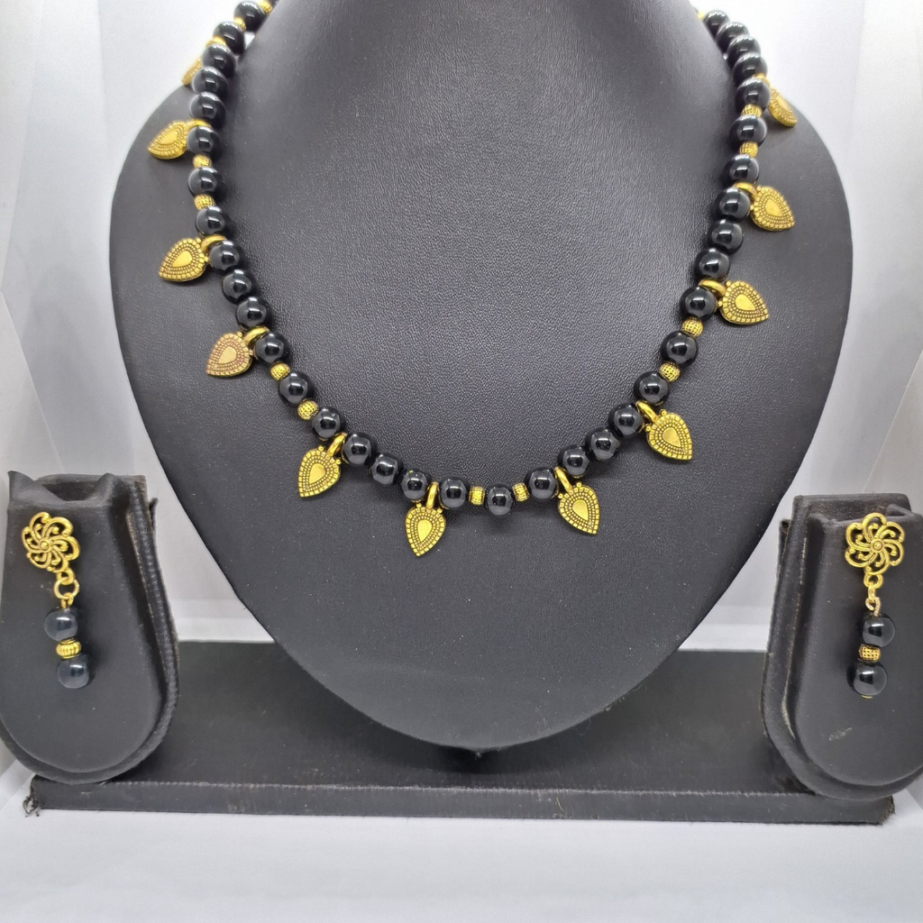 Black Beads and Golden Cham Necklace
